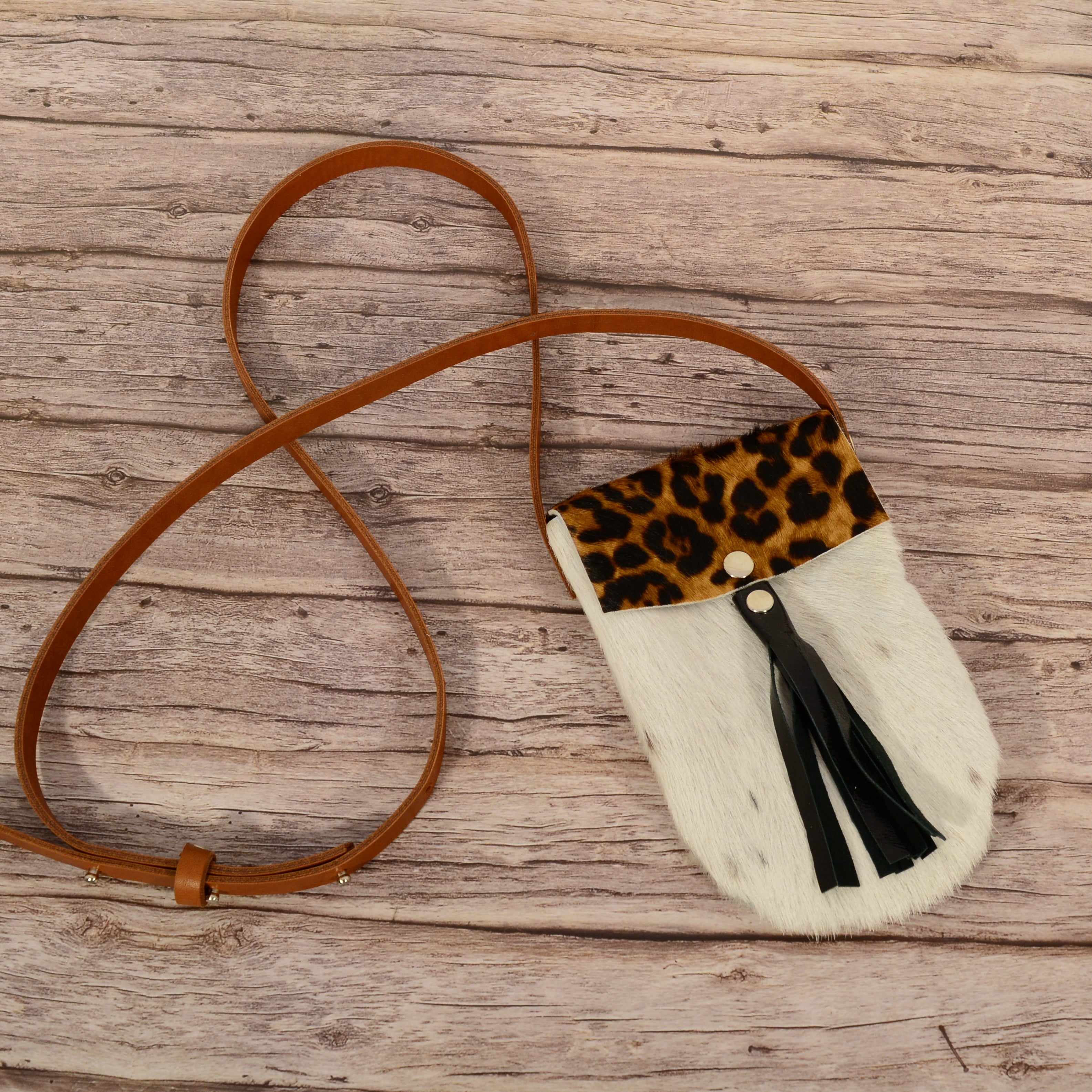 White fur phone crossbody bag with leopard print flap