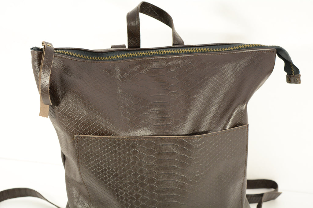 brown leather backpack her